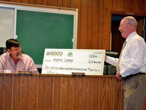 Mayor Roger Stagner and Administrator Sutherland Display GoCO Check
